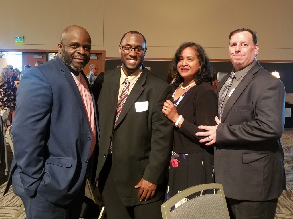 Left to right: King County Republican Party Vice Chairman Curtis Harmon, Zebulun Cobbs, Fatima Fields, and David Fields.